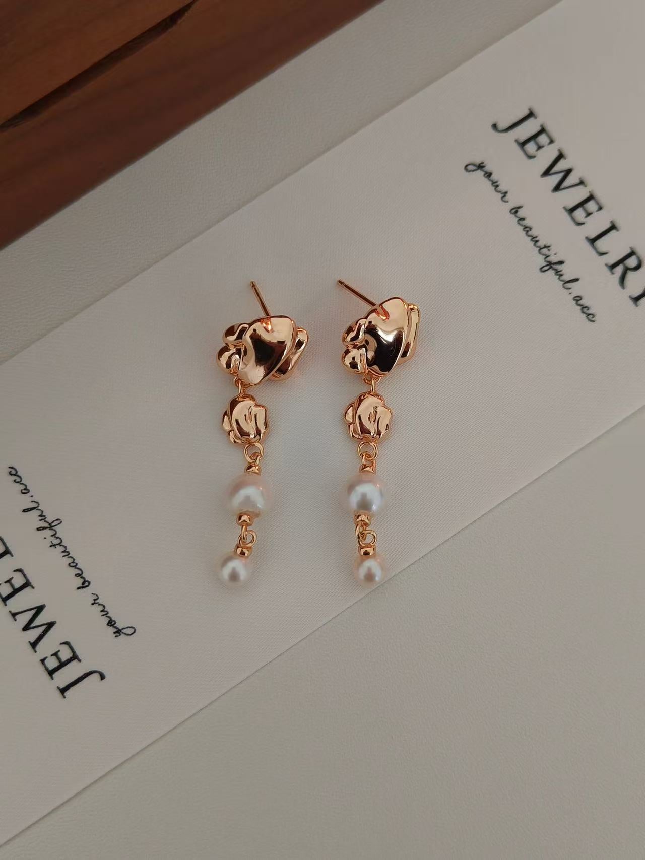 artistic gold dangle earrings